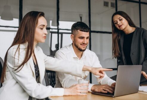 group-people-working-out-business-plan-office_1303-15858